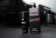 Produktbild Flacon mit Umverpackung Tabac Original Black Edition After Shave Lotion 100ml vor dunklem Hintergrund