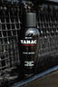 Produktbild Tabac Original Black Edition After Shave Lotion vor dunklem Hintergrund
